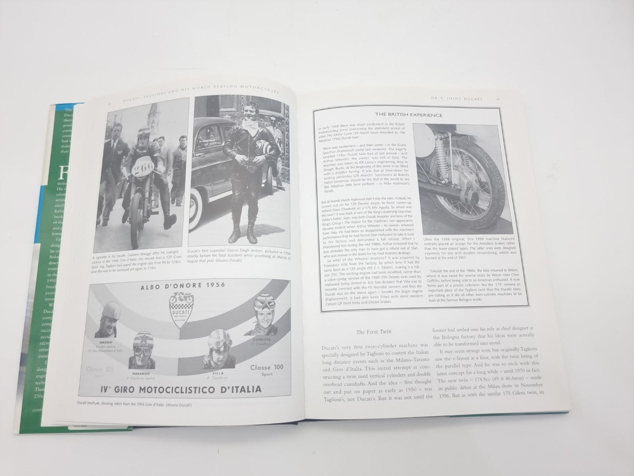 Open book spread with event photos and wheel close-up beside article text
