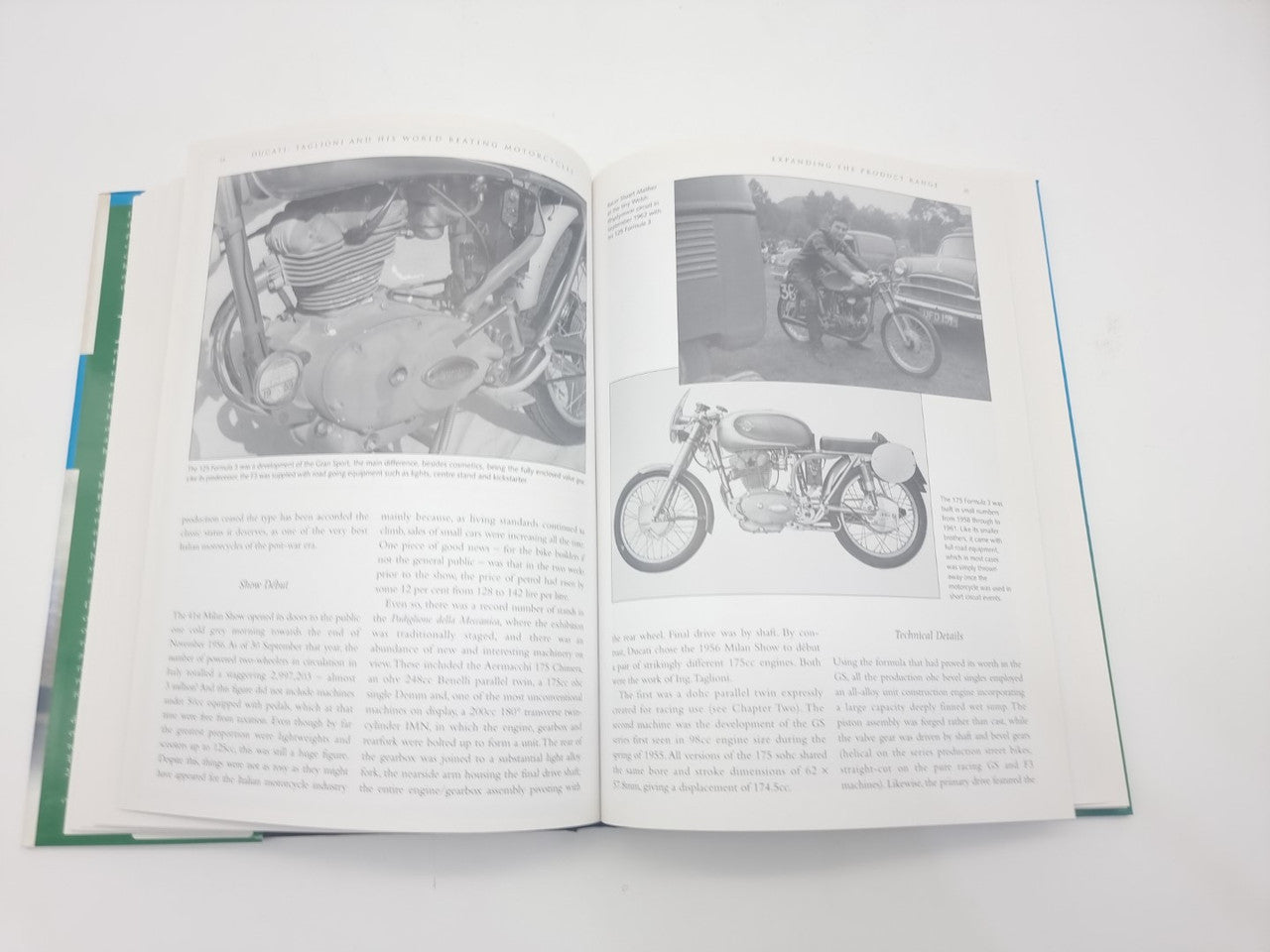 Open book spread with engine close-up photo and full motorcycle image