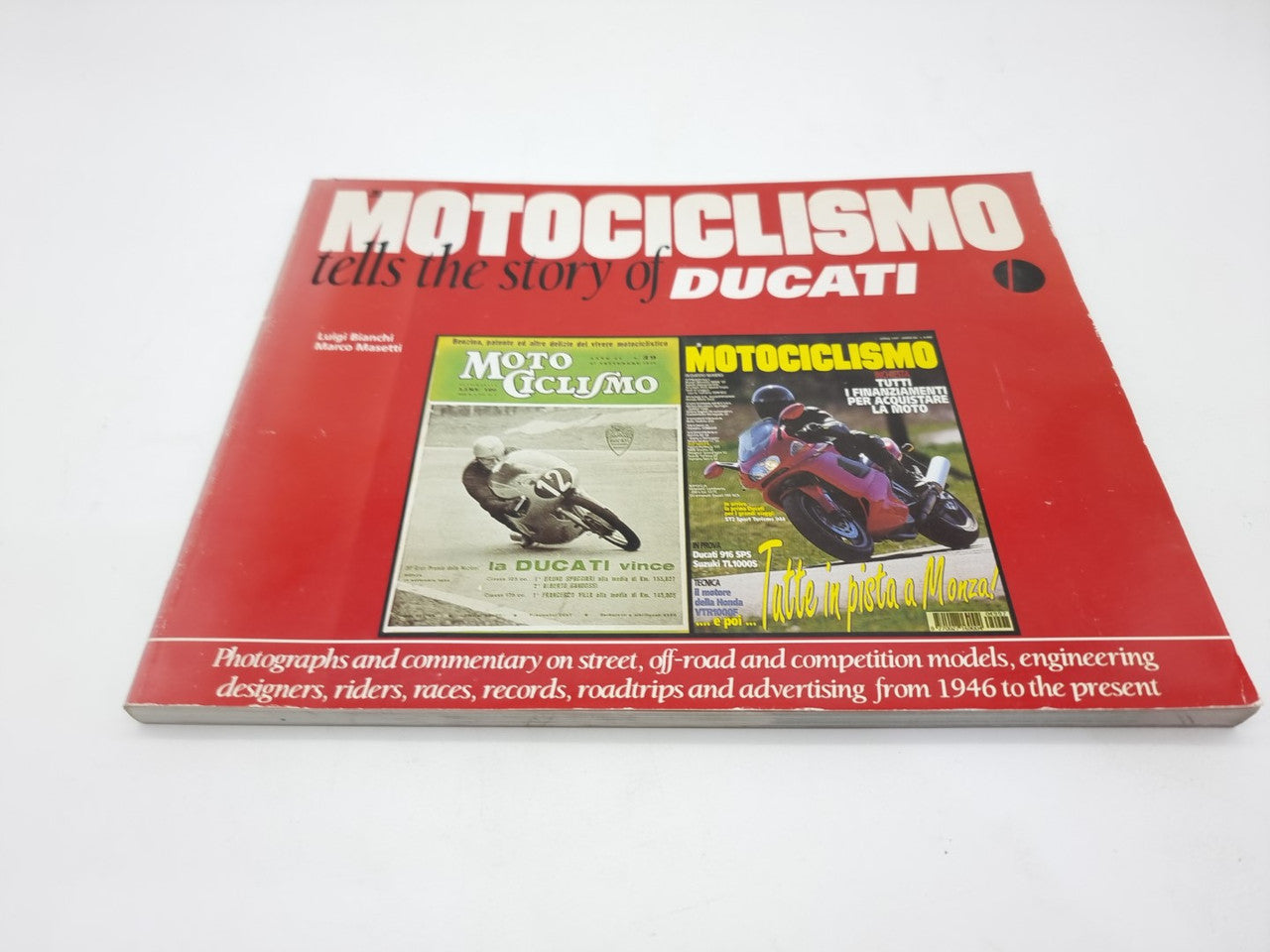 Red book cover with “Motociclismo tells the story of Ducati” and Ducati emblem