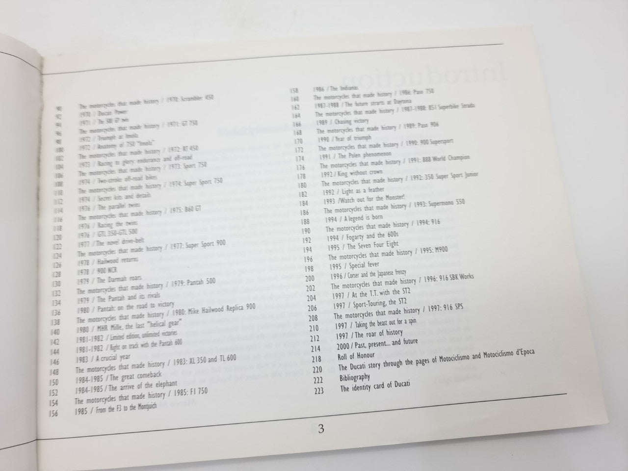 Opened book spread with two-column list of entries and page numbers