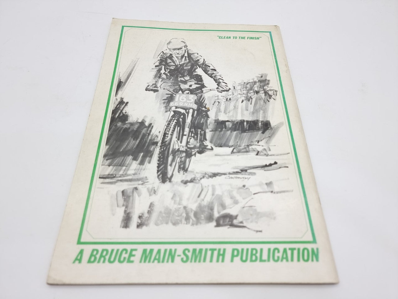 Motorcycle trials book cover with green border and "Clean to the Finish" title