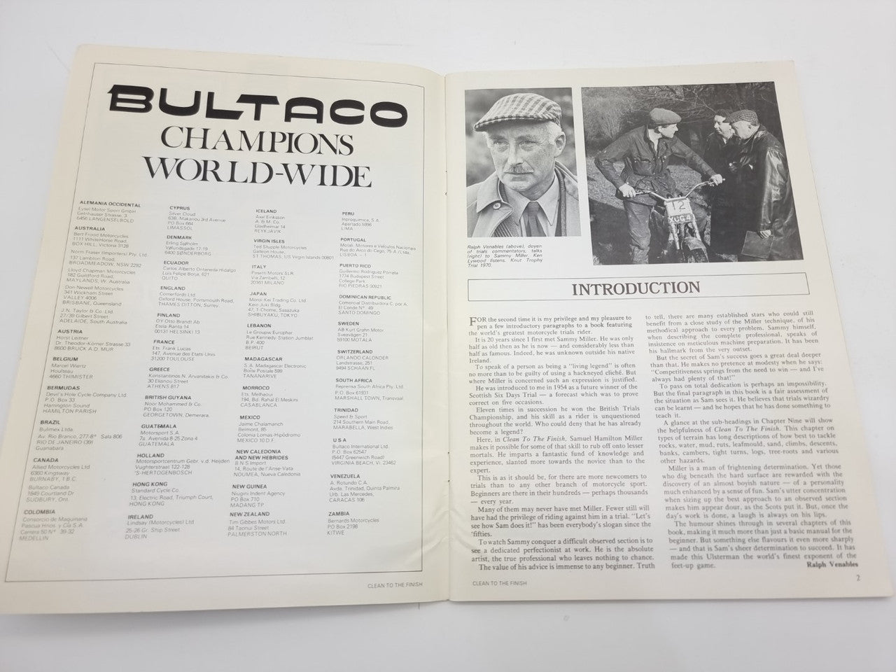 Open motorcycle championship book with "Bultaco champions" list and introduction photos
