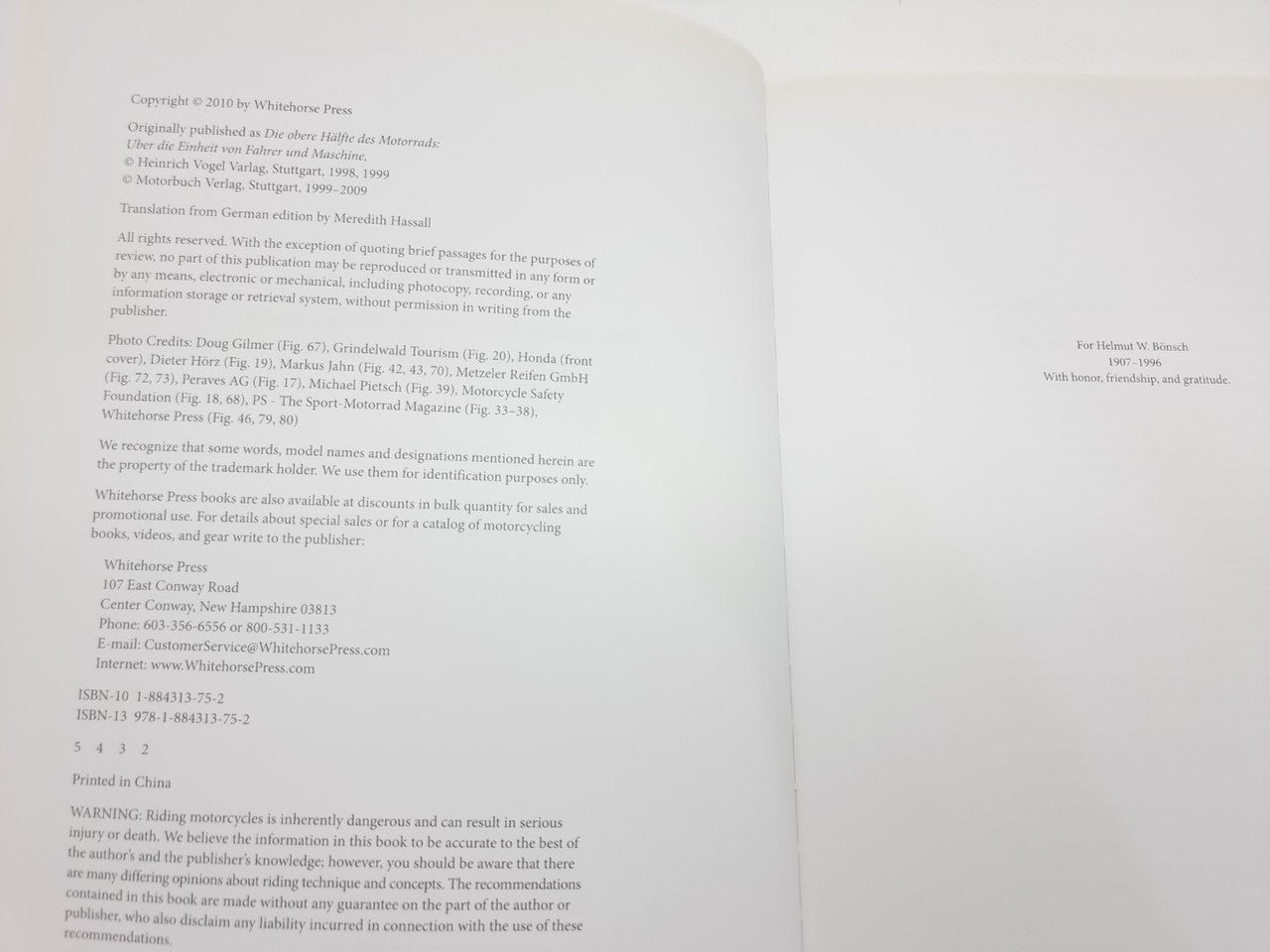 Open book with copyright and publishing information on two facing pages