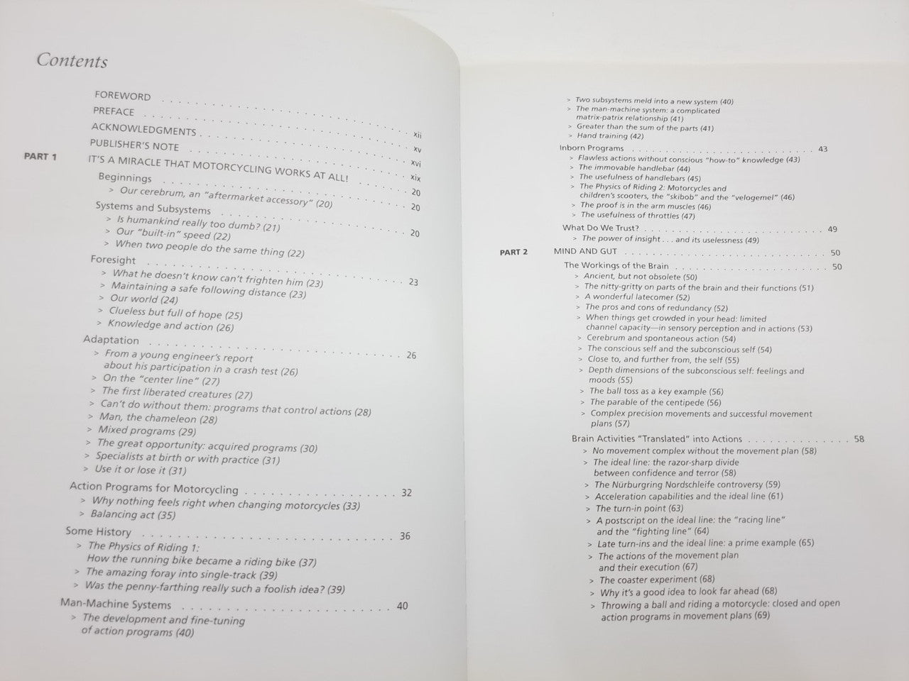 Open book contents pages with numbered sections and headings on two pages