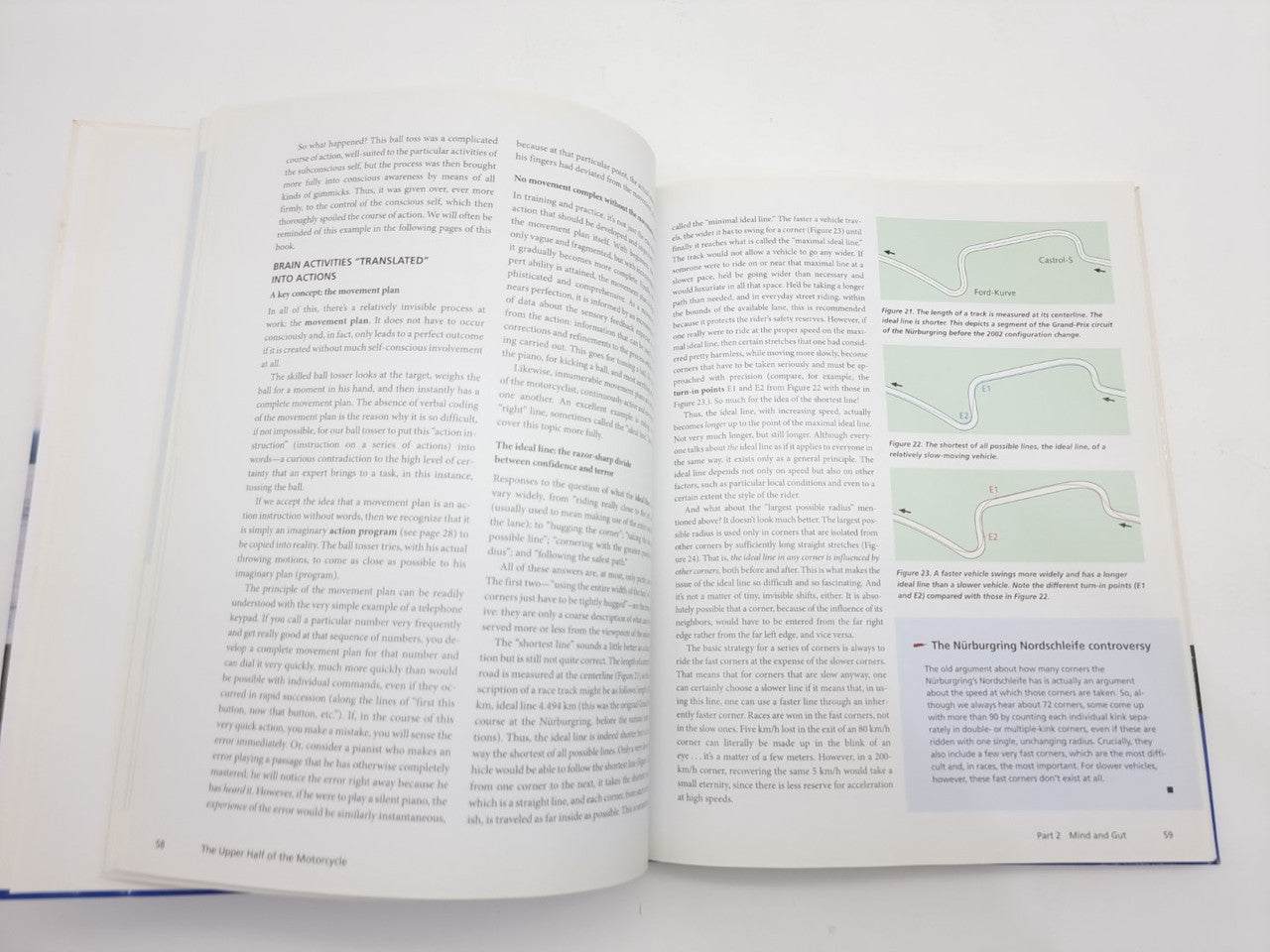 Open book spread with paragraphs and a diagram figure on the right page