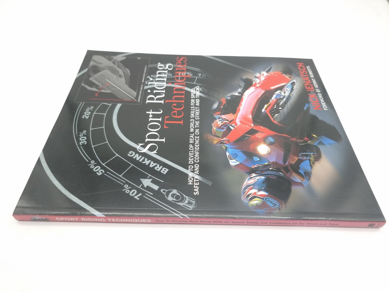 Sport riding techniques book with dark cover and red rider illustration