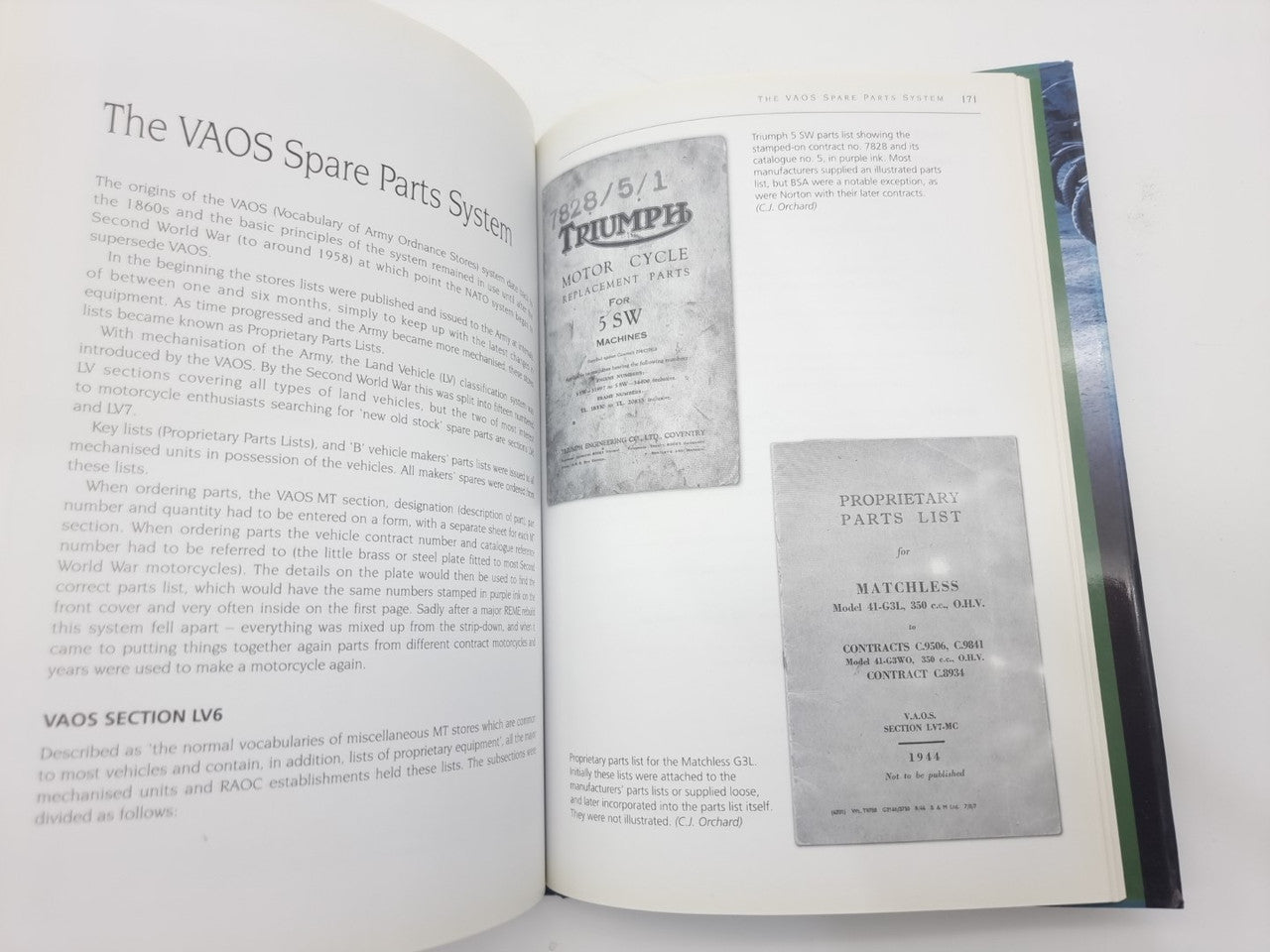 Motorcycles history book open, page about V A O S spare parts system with diagrams