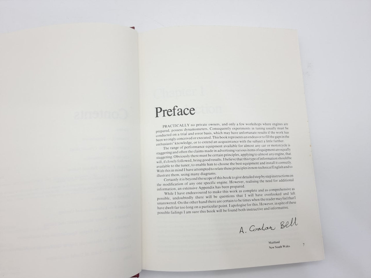 Open book showing Preface page with author name printed at the bottom