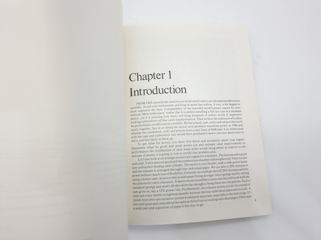 Open book showing Chapter 1 Introduction page with centered title and text