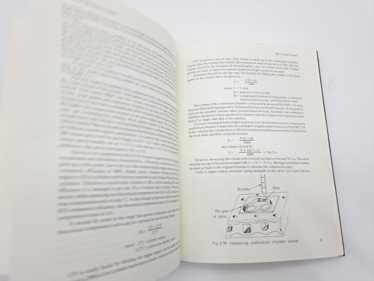 Open technical book with dense text and small diagram on right page