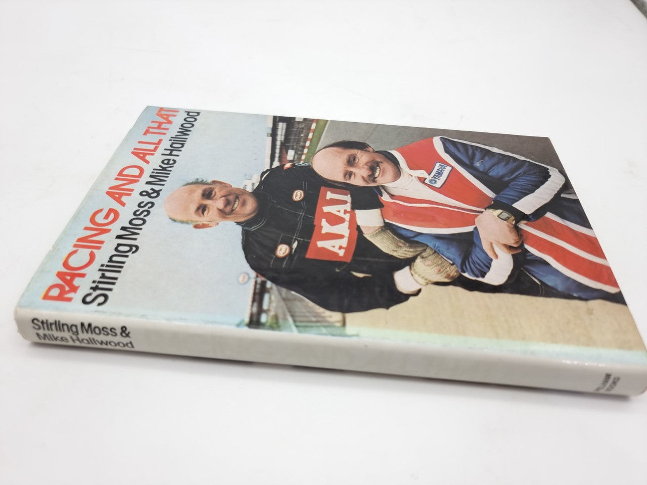 Motorsport book cover showing two drivers in racing suits, AKAI