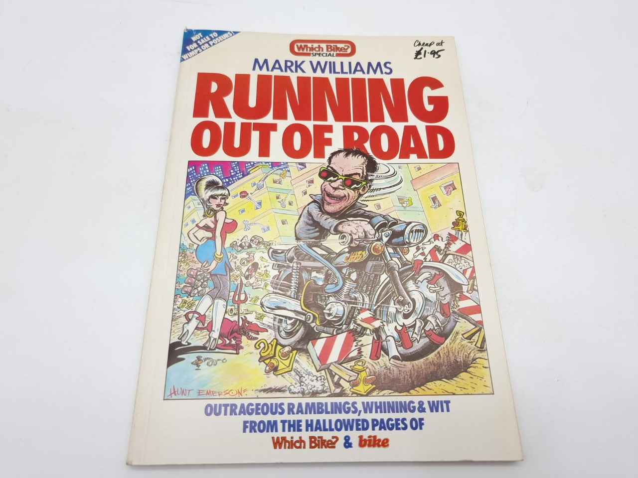 Paperback book front cover with RUNNING OUT OF ROAD title and colorful motorbike art