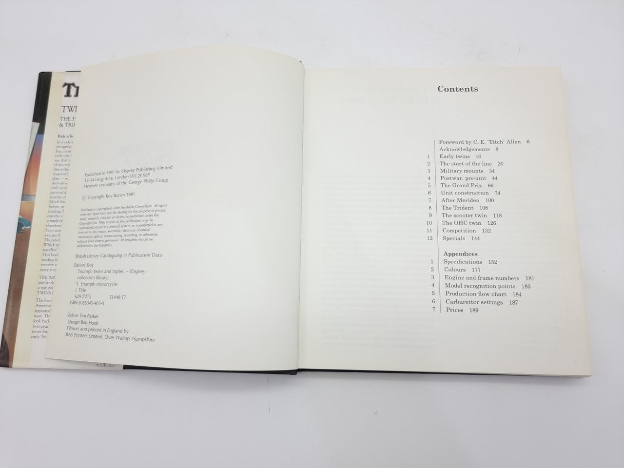 Open book pages with "Contents" heading and small printed section list