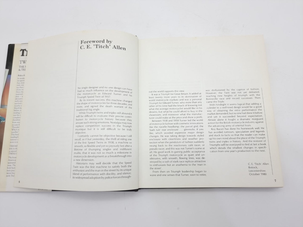 Open book with "Foreword" text across two white pages