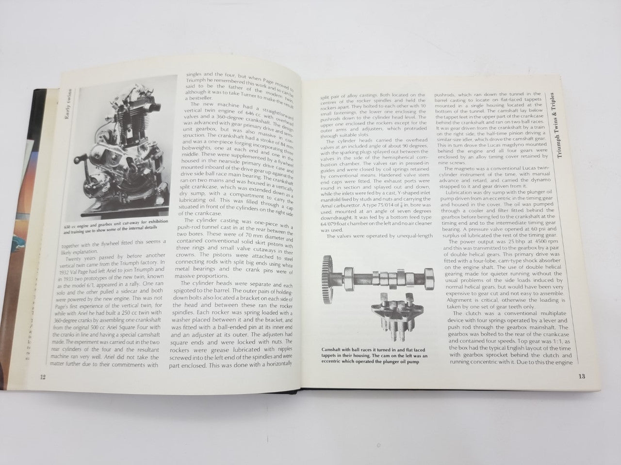 Open book spread with black-and-white motorcycle photos and printed paragraphs