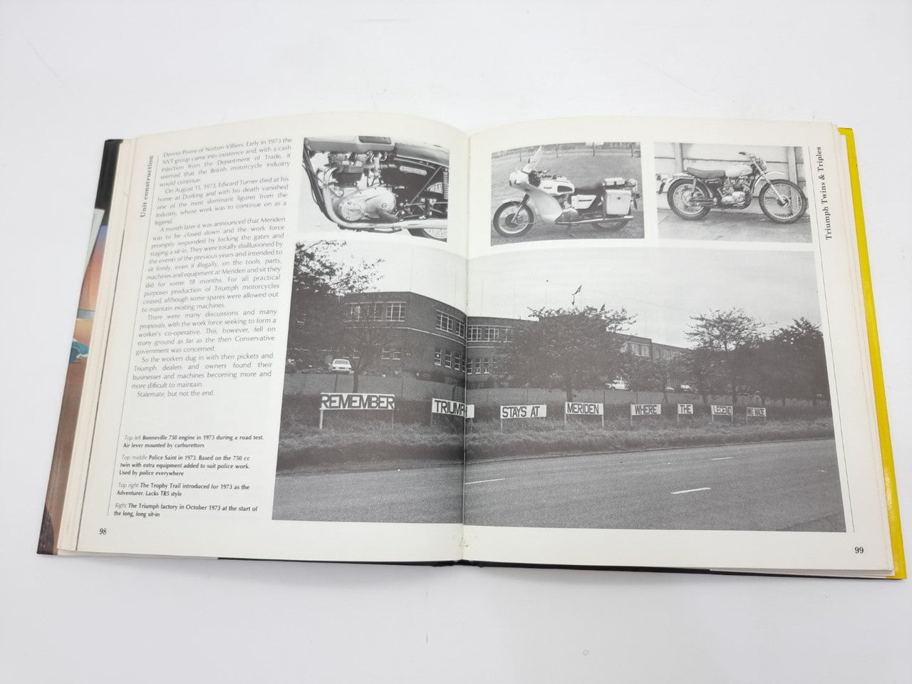 Open book spread with black-and-white photos and a yellow page edge
