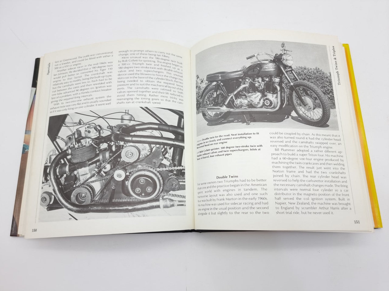 Open motorcycle repair manual showing black-and-white engine photos and text