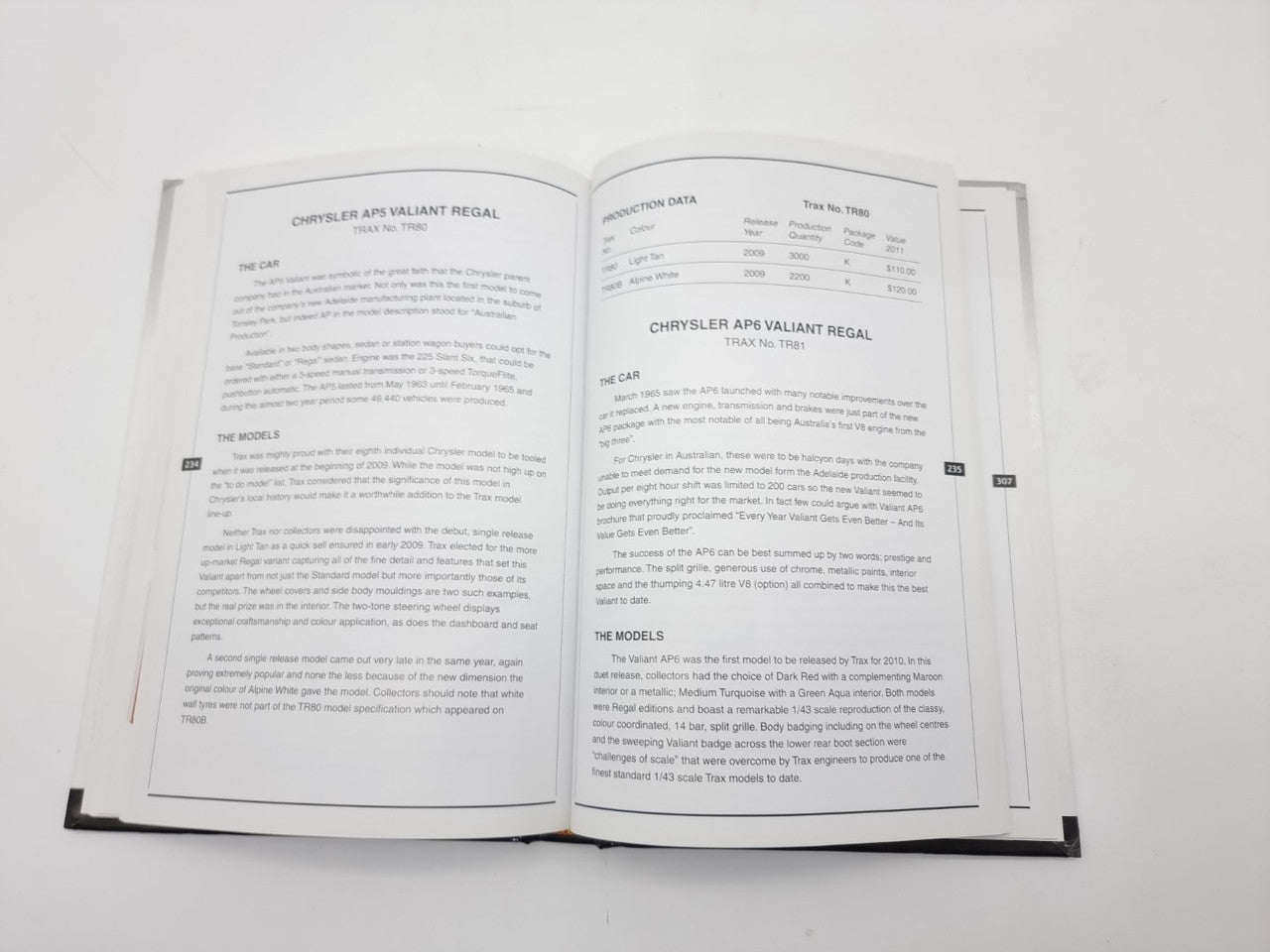 Model car guide book open to text pages titled “Chrysler APB Valiant Regal”
