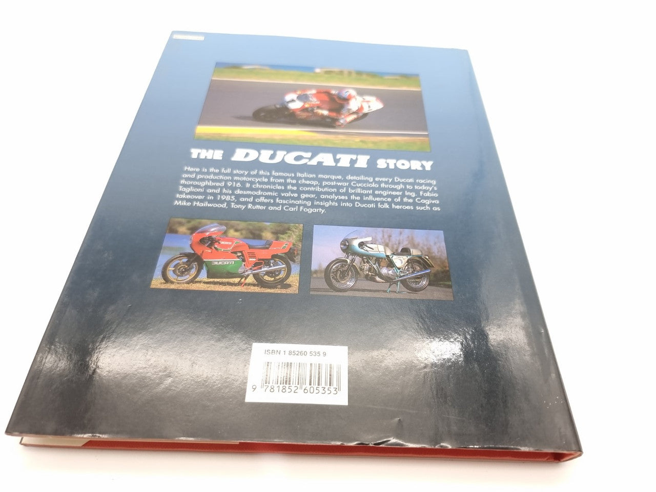 The Ducati Story book back cover with small motorcycle photos and barcode