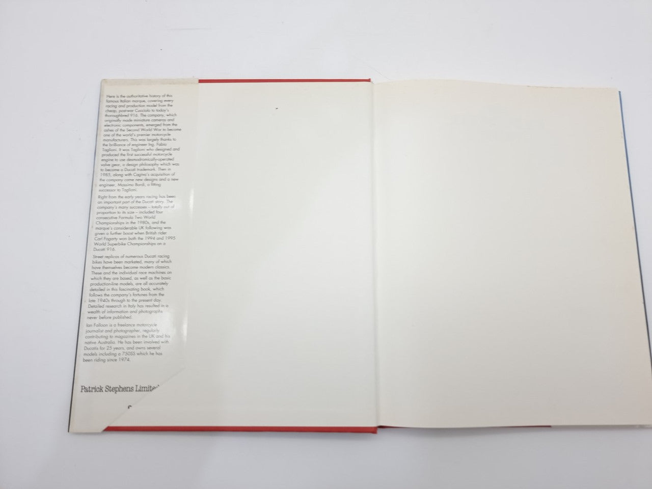 The Ducati Story open book showing left text page and blank right page