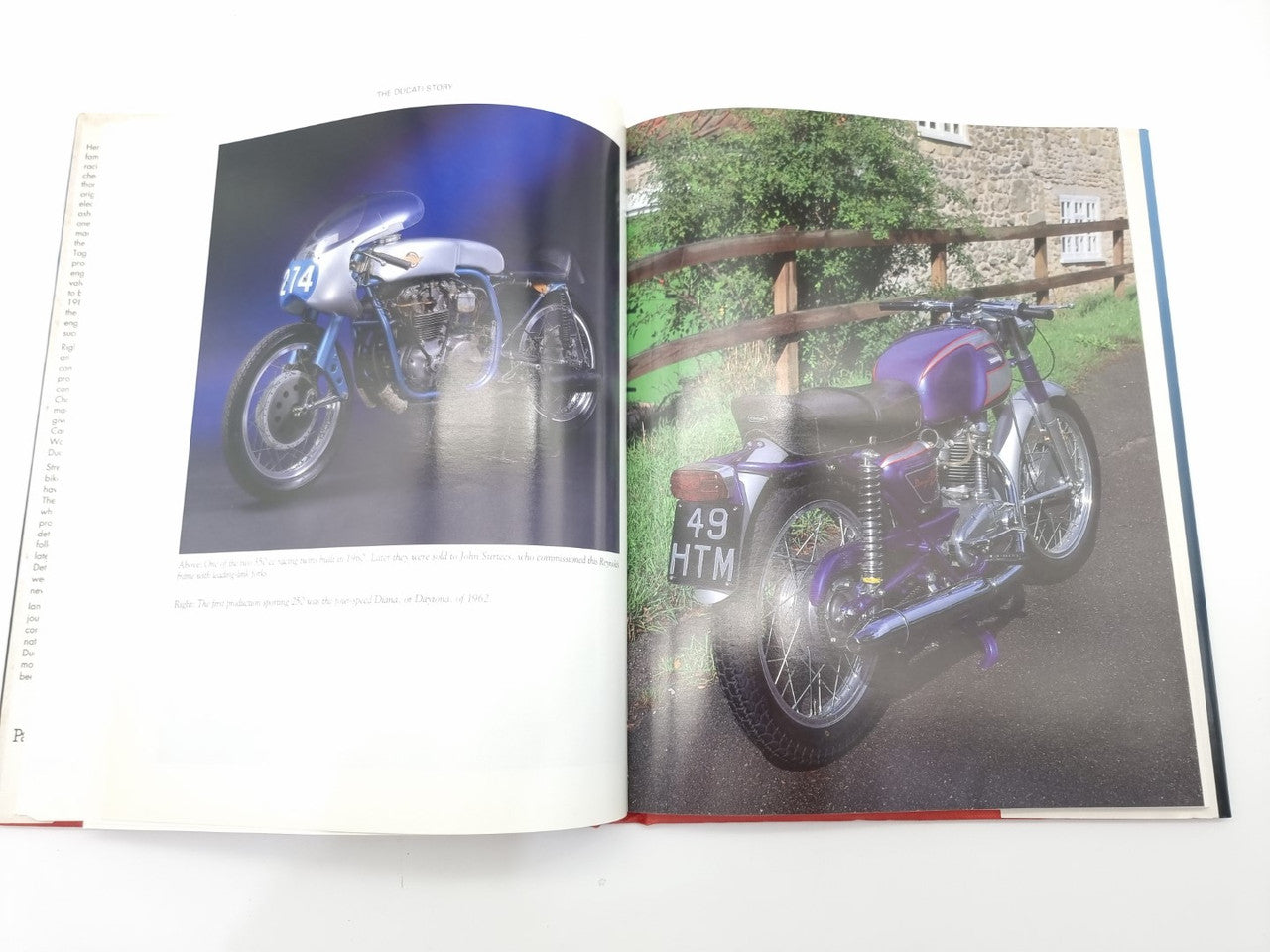 Motorcycle photo book, open spread with motorcycle pictures on both pages