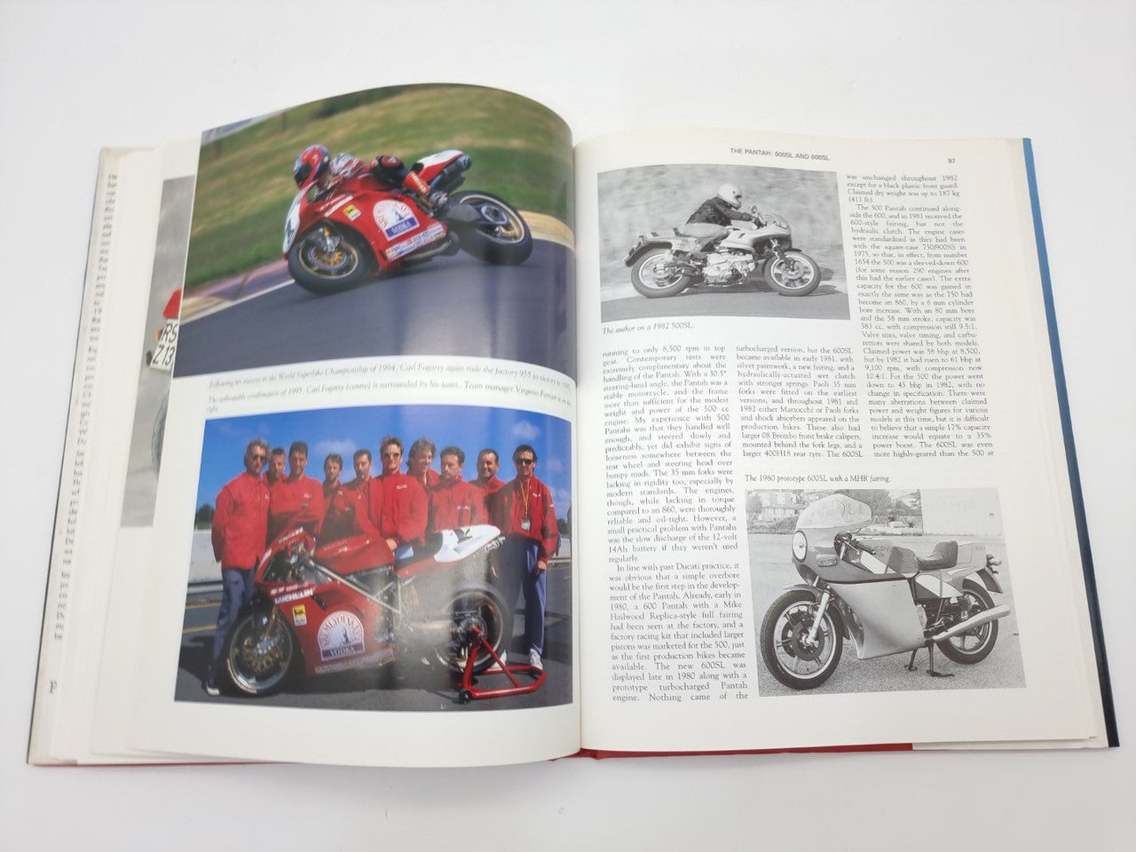Motorcycle photo book, open spread with racing bike photo and group portrait