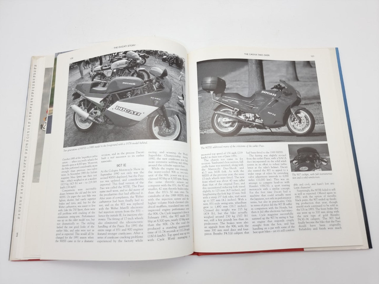 Motorcycle photo book, open spread with black-and-white motorcycle photos and closeups