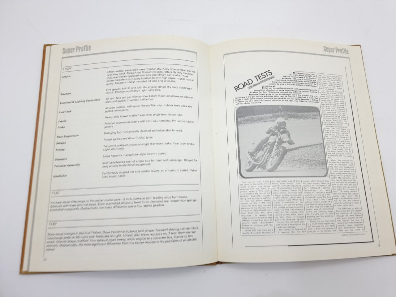 Triumph Trident motorcycle manual open to road tests page with photo box.
