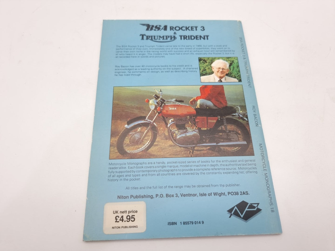 Motorcycle monograph book back cover with pricing, author photo, and motorcycle image