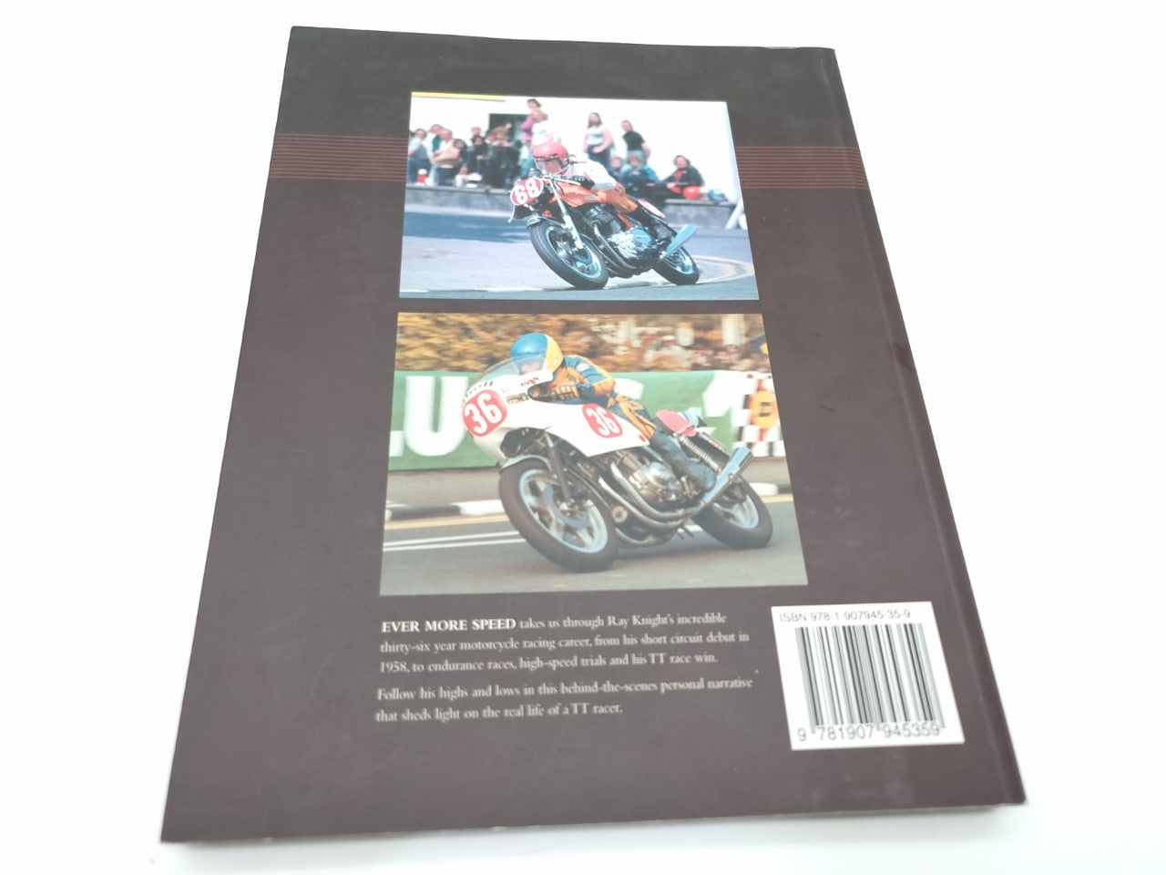 Paperback back cover with two small motorcycle photos and a barcode