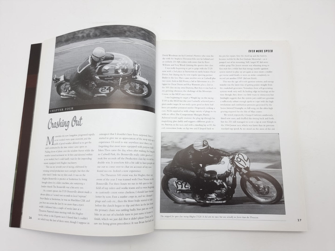 Open paperback with racing chapter text and a black-and-white motorcycle action photo