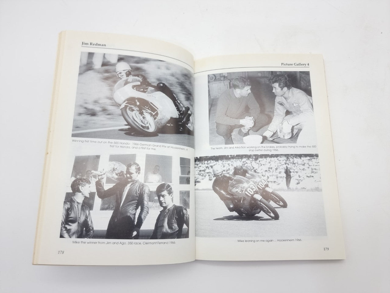 Open book spread with black-and-white motorcycle and group photos arranged in multiple frames
