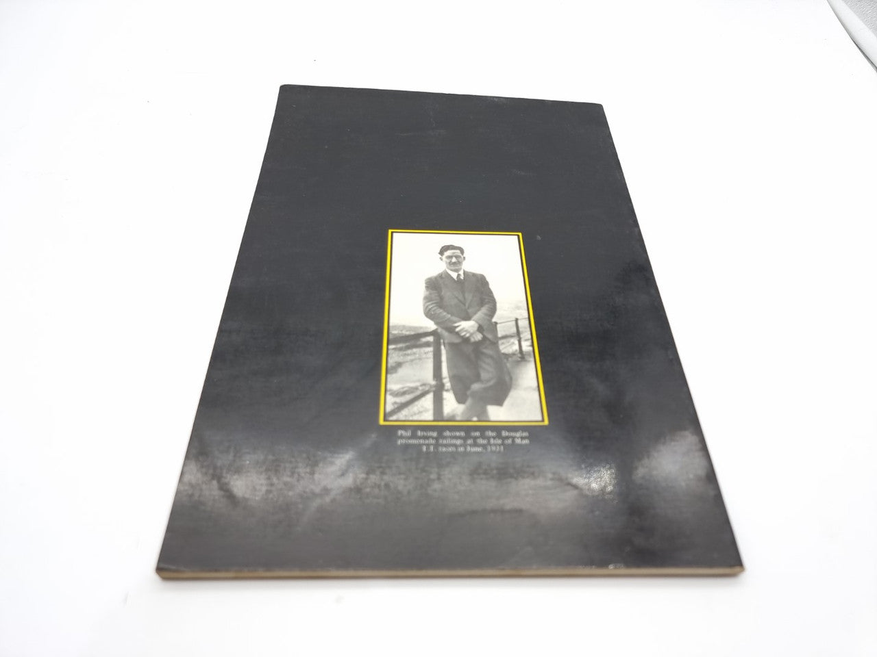Motorcycle technicalities hardcover book with author photo on a dark cover