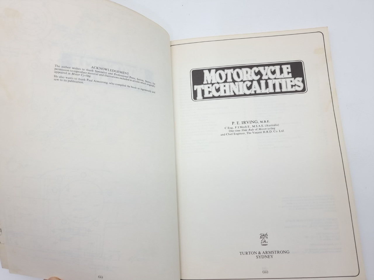 Motorcycle technicalities book open to title page with logo and author name