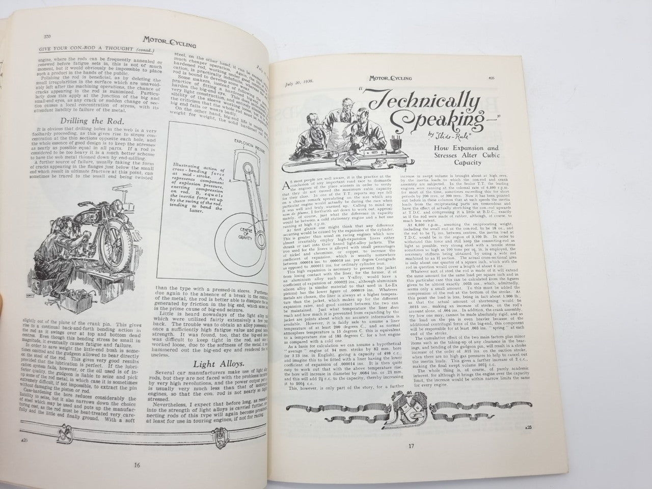 Motorcycle technicalities book open to a feature article and technical diagram