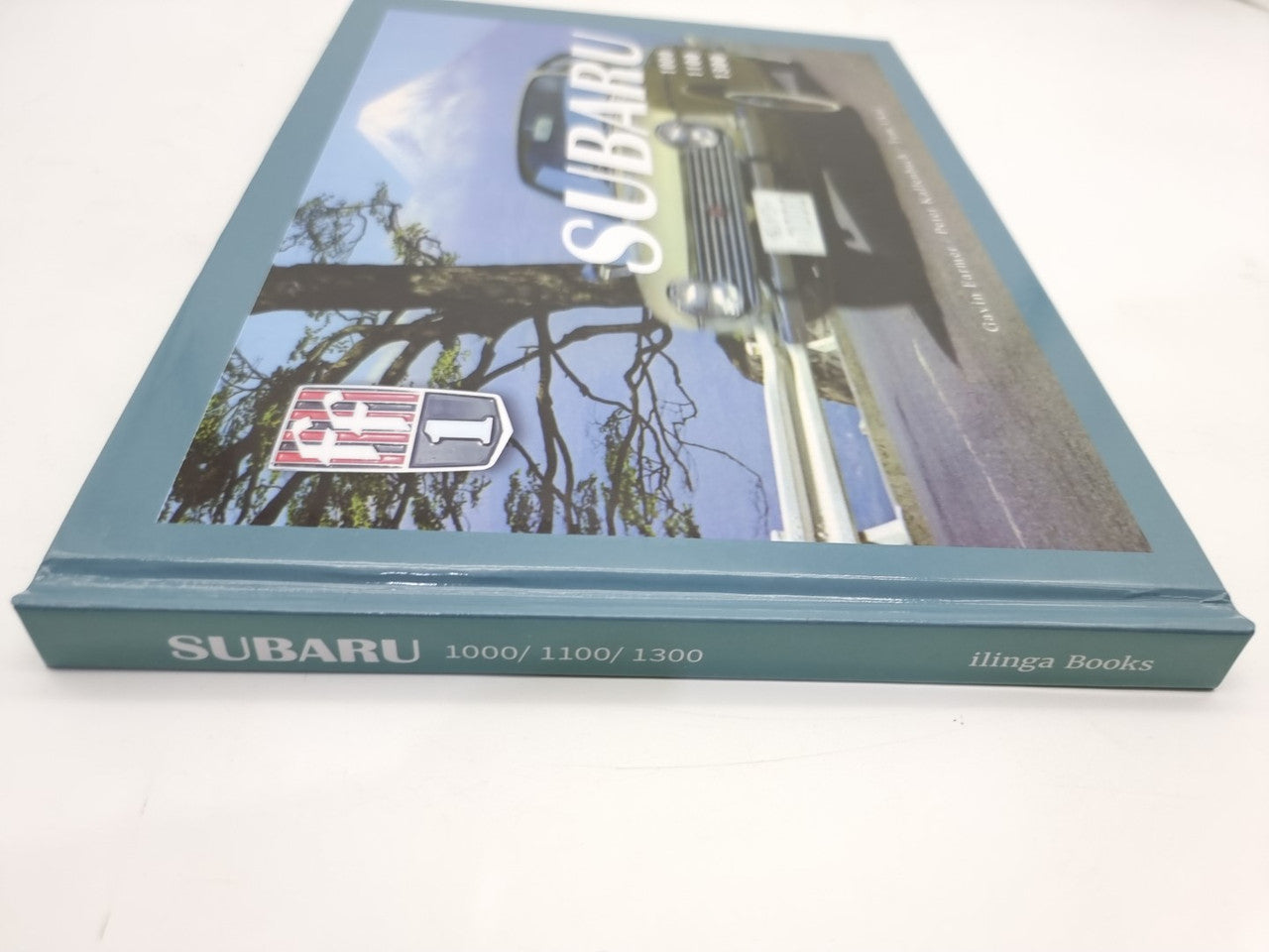 Subaru 100, 1100, 1300 book with spine and cover showing “SUBARU 1000/1100/1300”