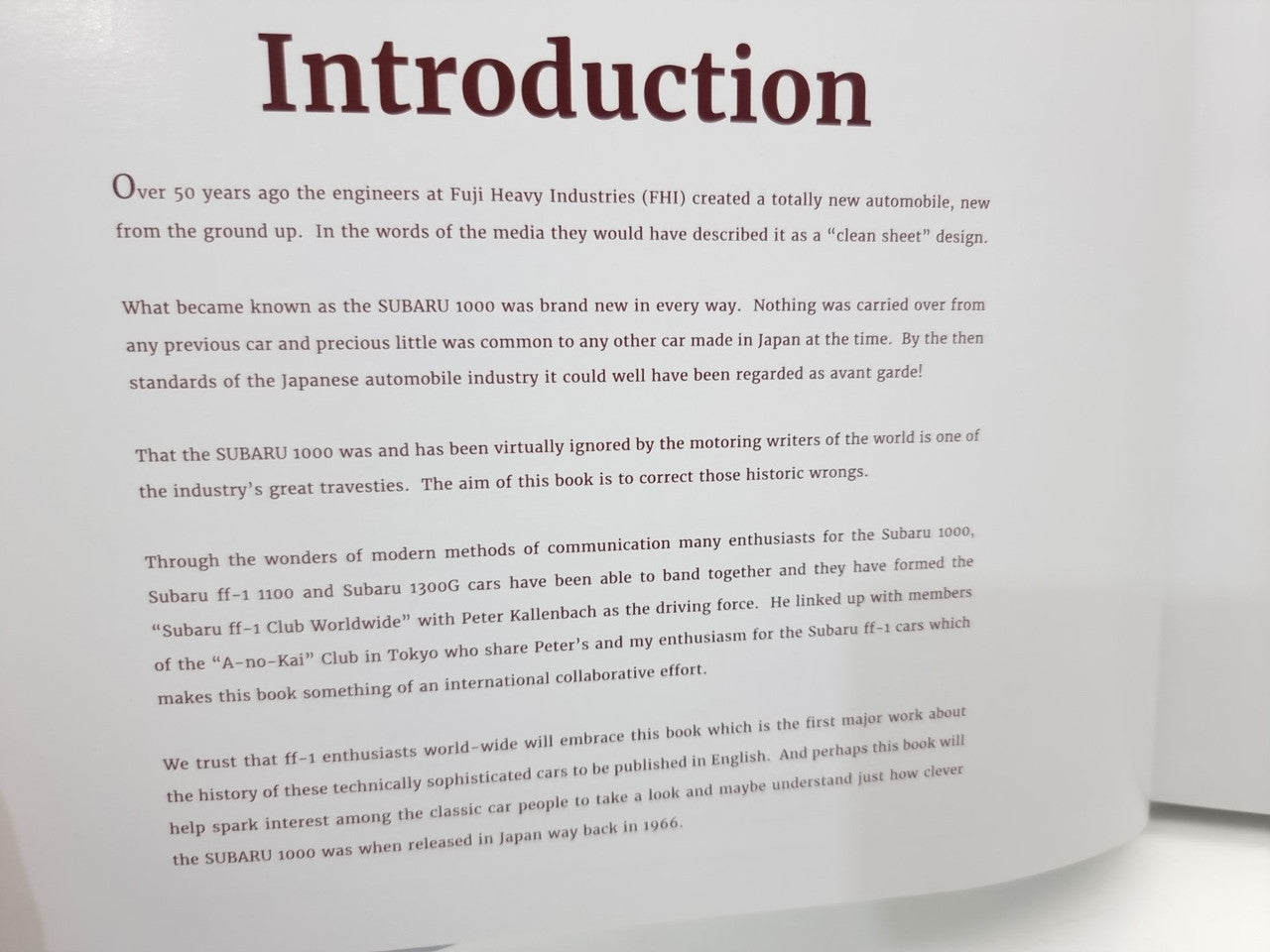 Subaru 100, 1100, 1300 book open to the Introduction page with printed text