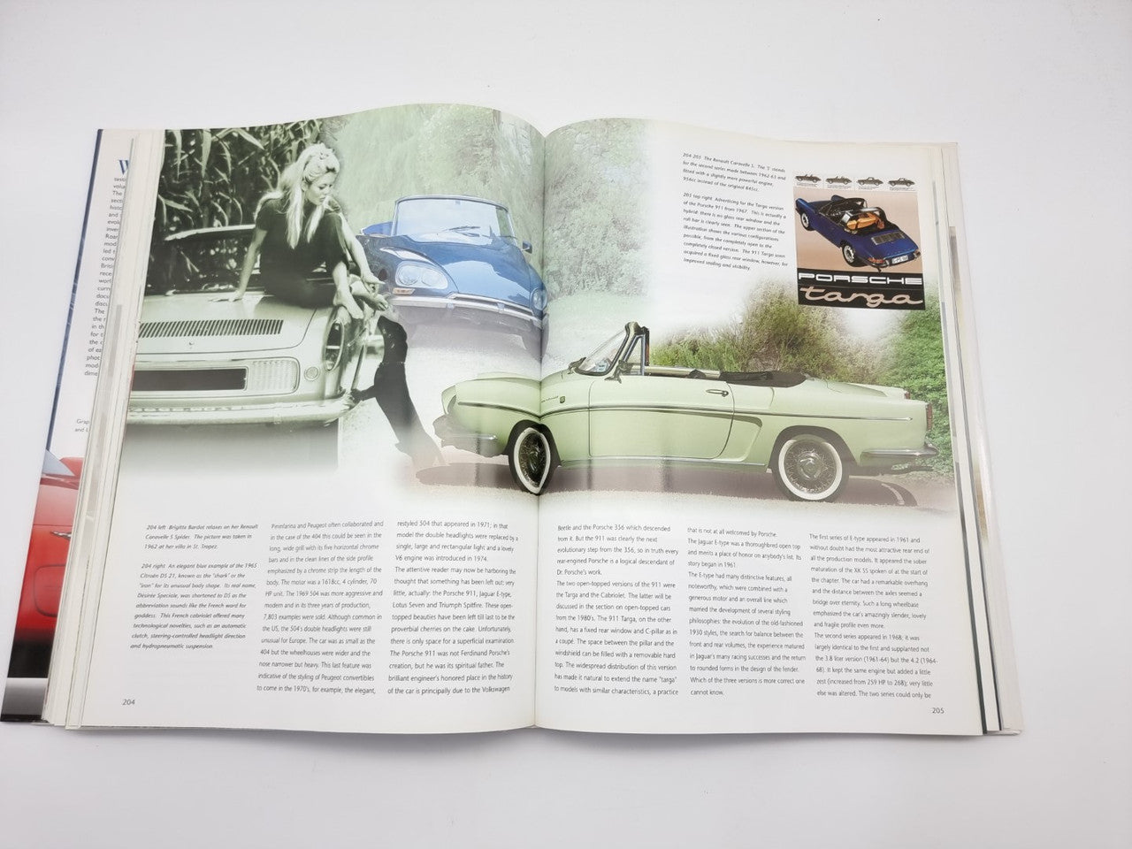 Open book spread with a light green convertible and a blue classic car photo.