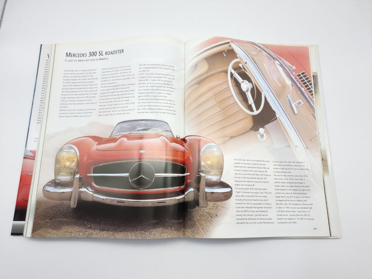 Open book page with red convertible car front view and side profile photo