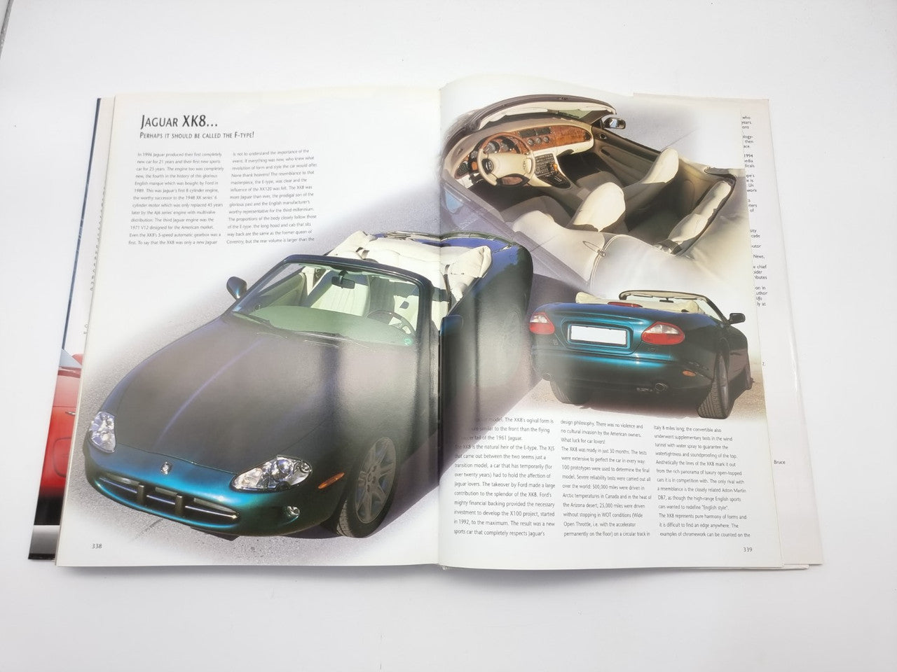 Open book with dark convertible photo and cutaway interior diagram on facing pages