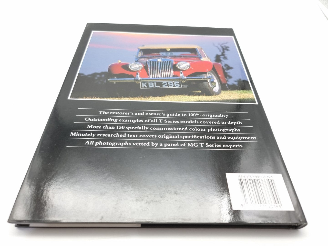 Automotive restoration guide book cover angled, with red classic car photo and barcode
