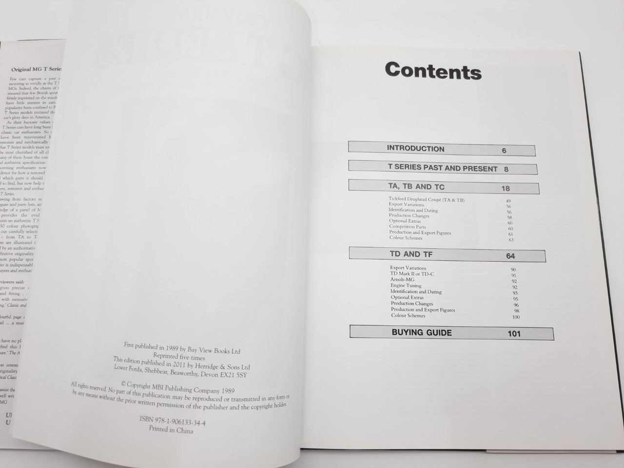 Open book showing contents page with boxed section titles and page numbers