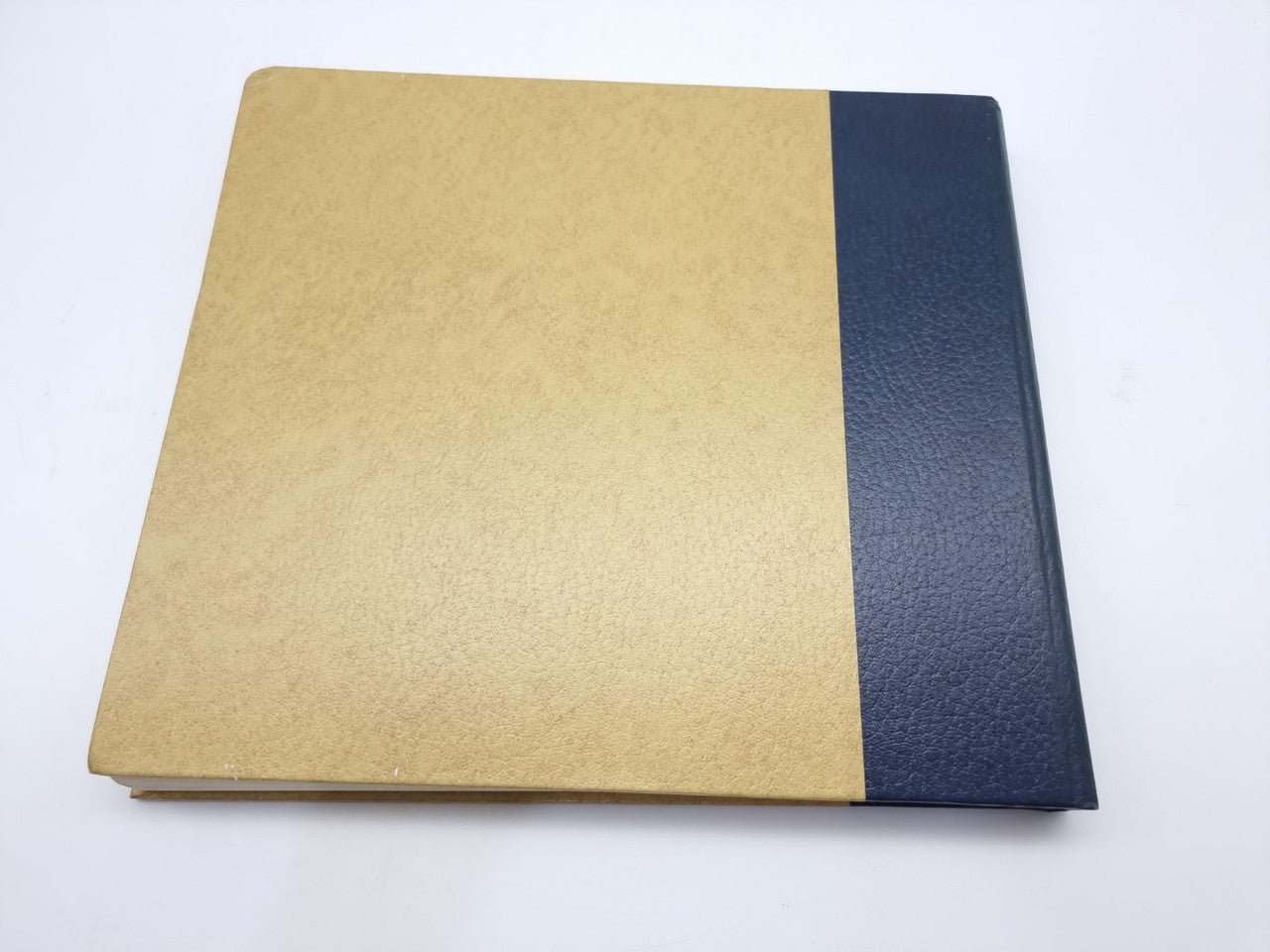 AA automobile association history book, tan and dark blue hardcover back