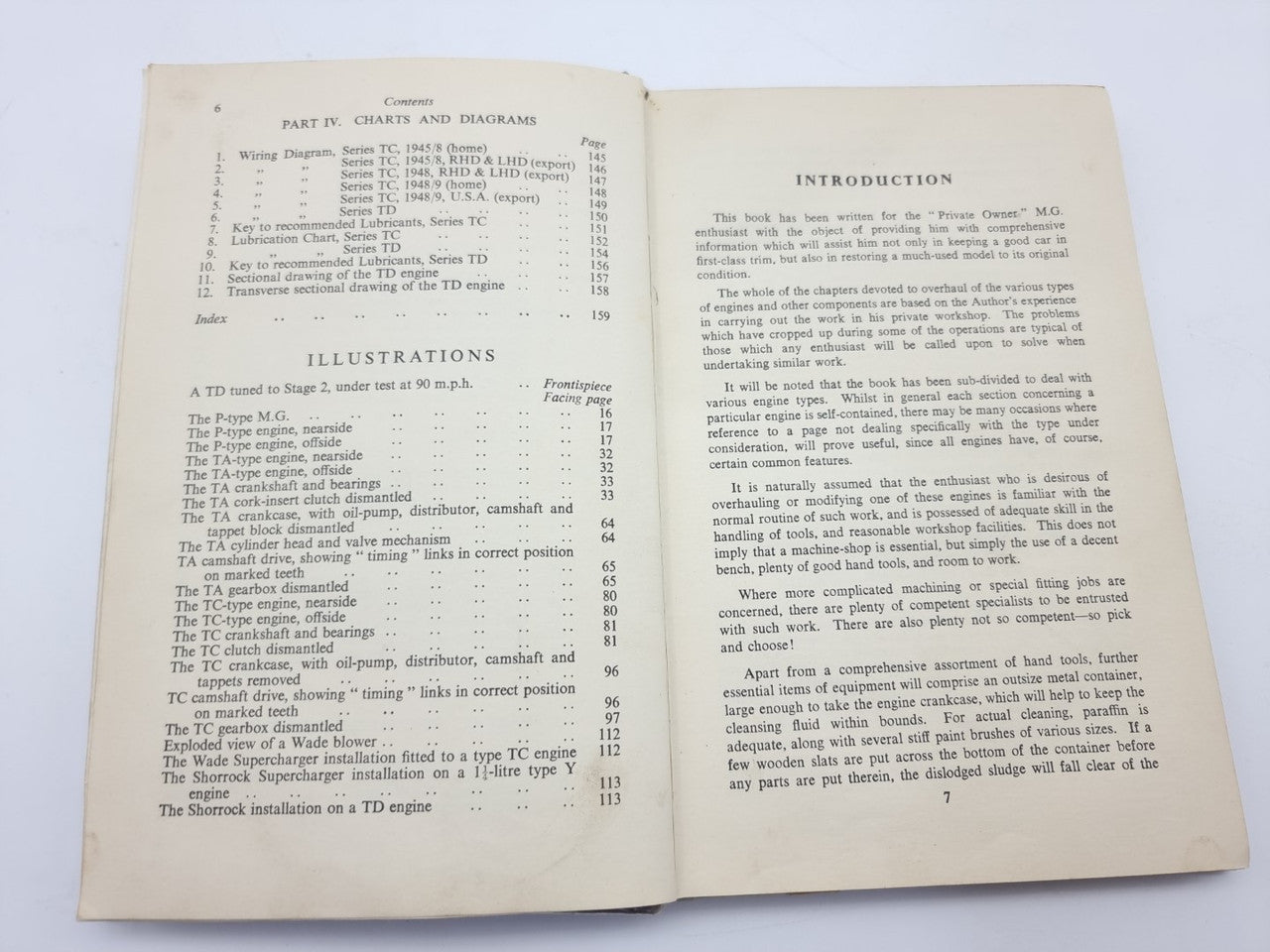 Open vintage car maintenance manual showing illustrations list and introduction text