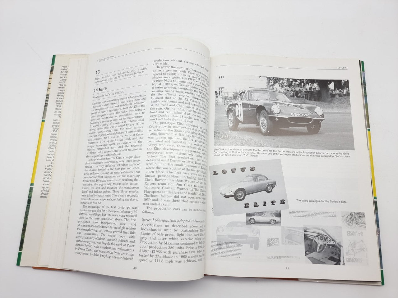 Open book with text columns and grayscale racing car photos with captions