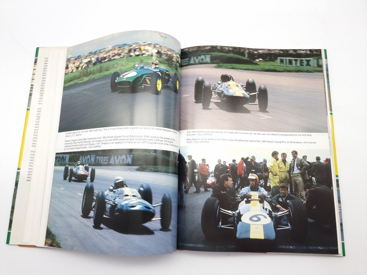 Open book with full-page racing track photos and a group photo collage