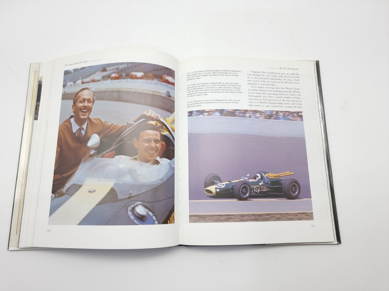 Motor racing book open pages with smiling driver photo and race car action image