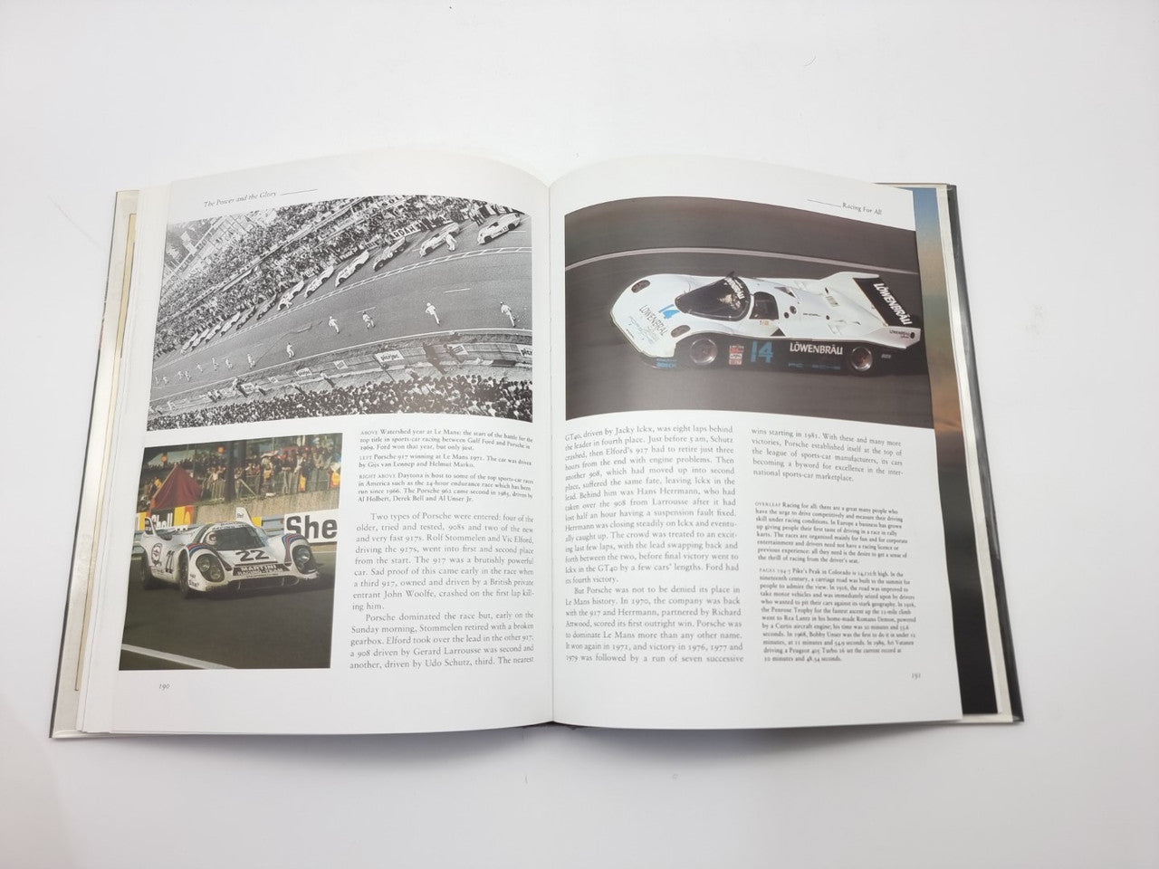 Motor racing book open spread with stadium crowd photo and race car image
