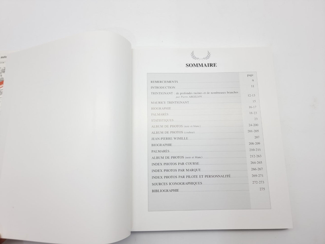 Racing biography book opened to table of contents page with light text and lines