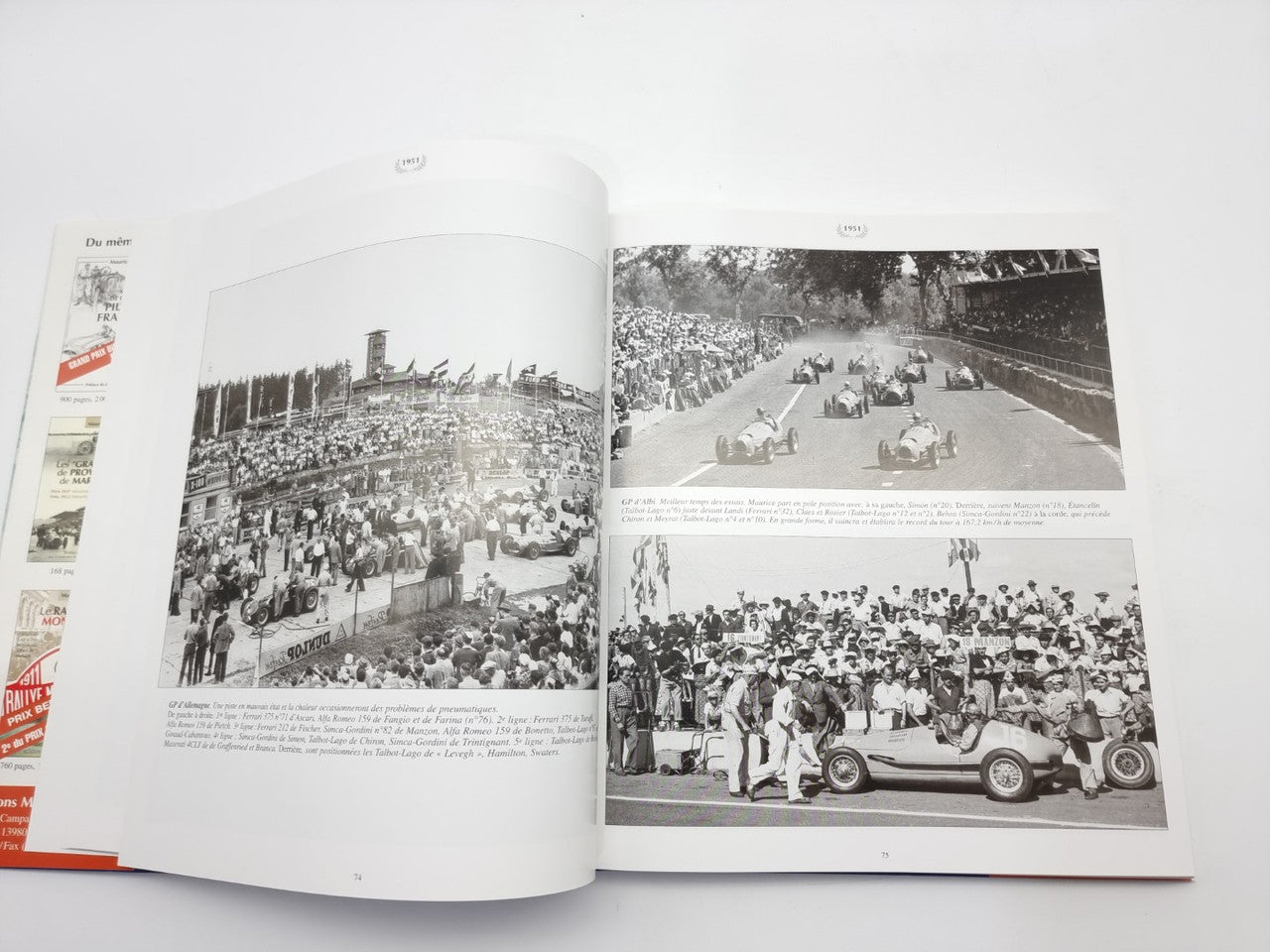 Racing biography book opened with crowd and race action photos across two pages